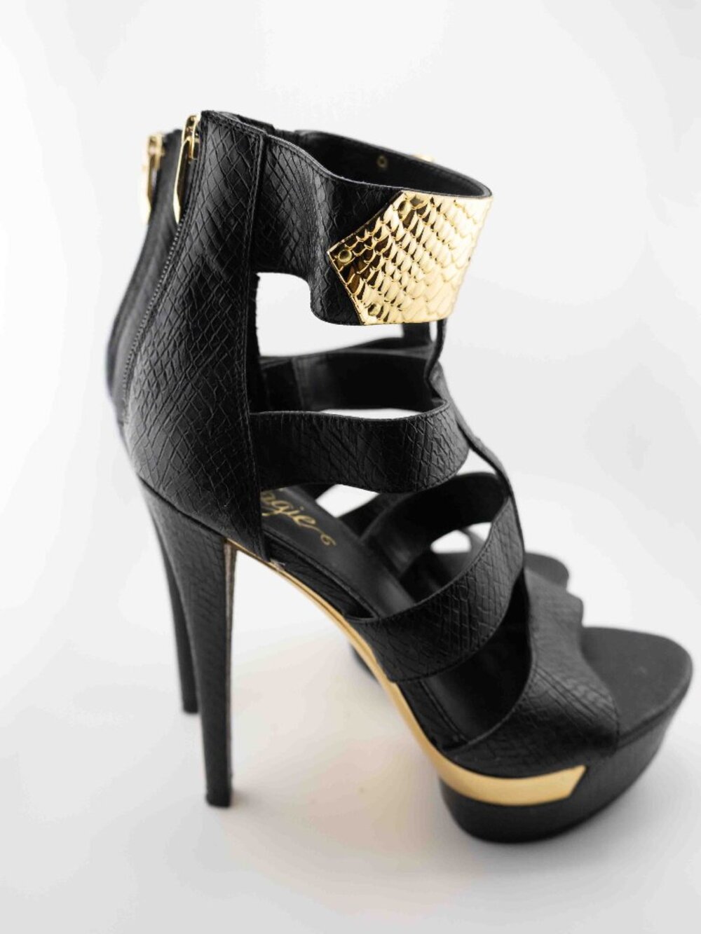 Fergie Black & Gold Platforms